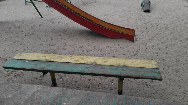 istock Elements and swings on a playground in city 1219504182