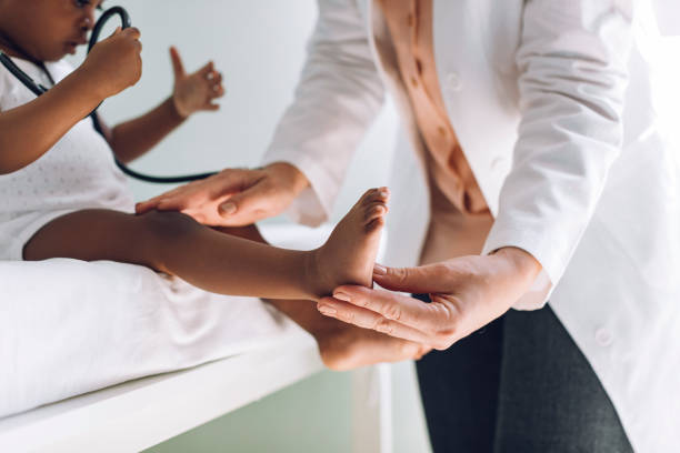 Medical Checkup: a Doctor Examining a Toddler at her Office