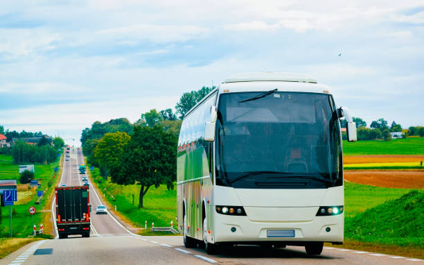 istock White Tourist bus on road Poland 1219510086