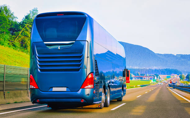 istock Blue Tourist bus on road in Poland 1219510102