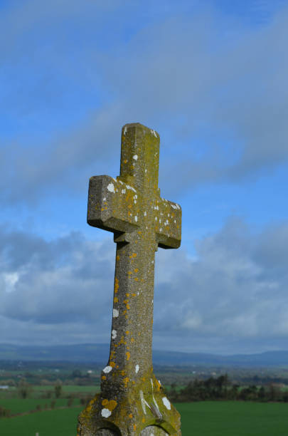 istock Stone Cross Against a Blue Sky in Ireland 1219510801