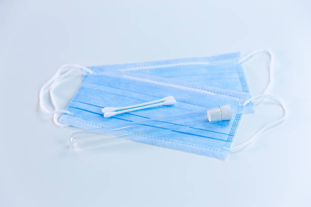 istock Disposable medical mask, cotton swab 1219512009