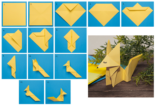 Group of white paper boats and one yellow paper boat going different direction on blue background