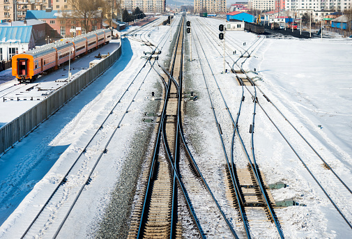 Train running on the track in winter.