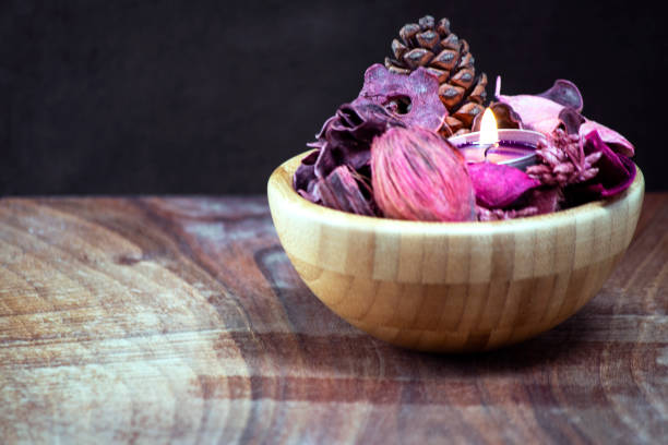 istock Pink light candle with potpuorri for relaxation, romantic, spa, wellness concepts 1219514681