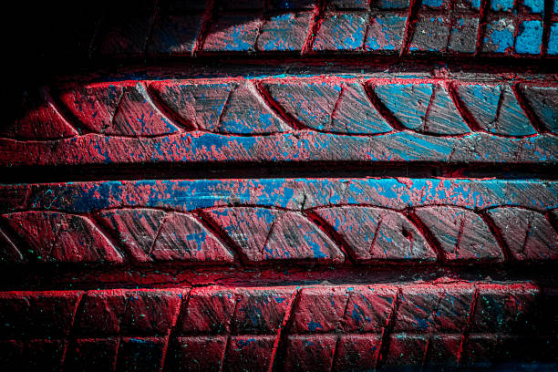istock Abstract painted art background. Graffiti wall. Car tire texture. 1219515741