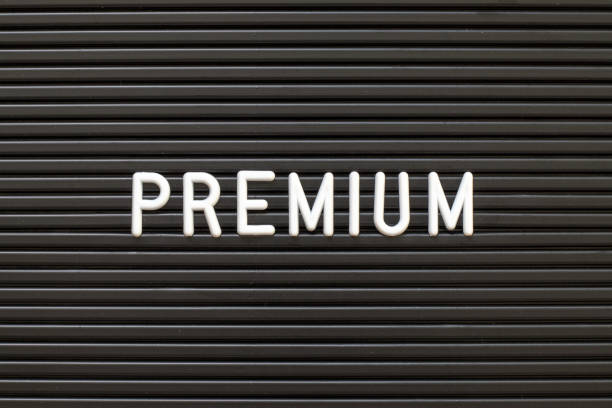 istock Black color felt letter board with white alphabet in word premium background 1219515909