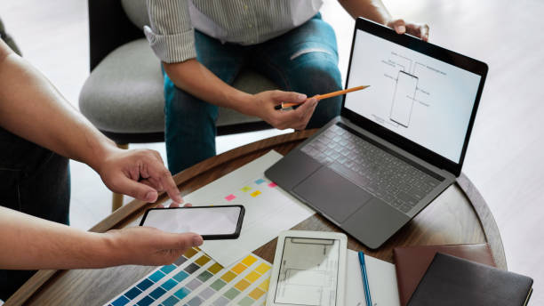 istock Creative team analyzing prototype products for product design in Coworking Space, teamwork collaboration concept 1219516186