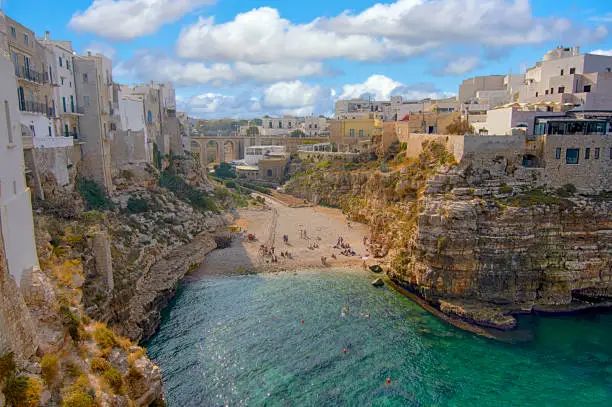 Summertime beach of Cala Paura - Polignano a Mare - Apulia - Italy.