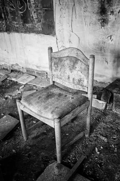 istock Chair abandoned house 1219518438