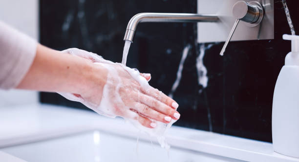 istock Washing hands with foam soap. Hygiene, preventing coronavirus 1219518510