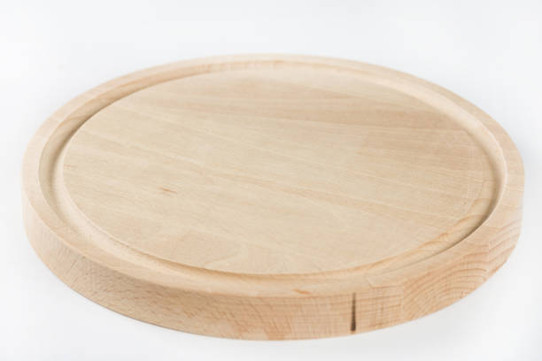 istock Round kitchen cutting wooden board on the white background 1219519936