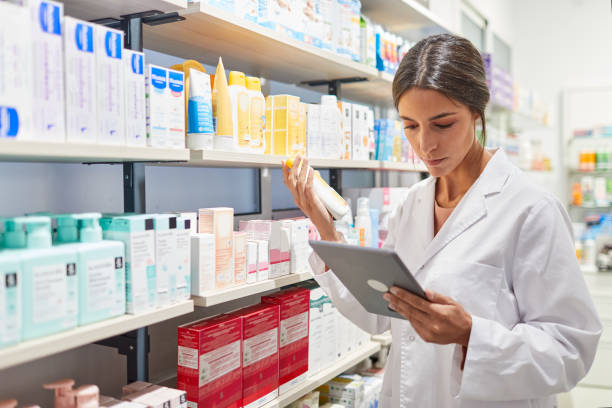 istock One young pharmacist taking inventory on a digital tablet. 1219521883