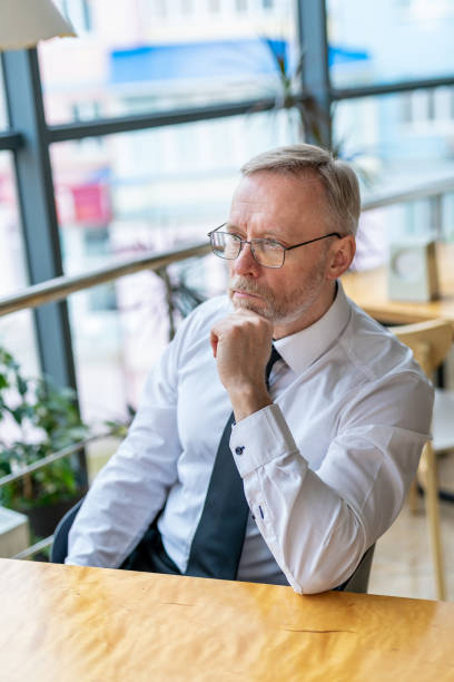 istock Mature businessman looking in front. 1219529003