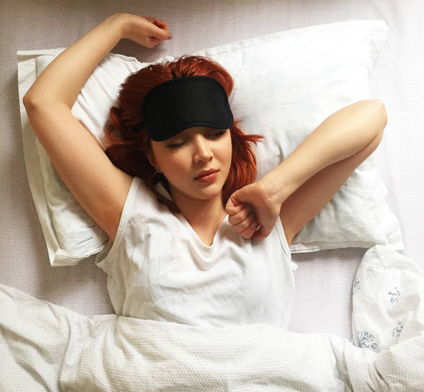istock girl wakes up 1219529222