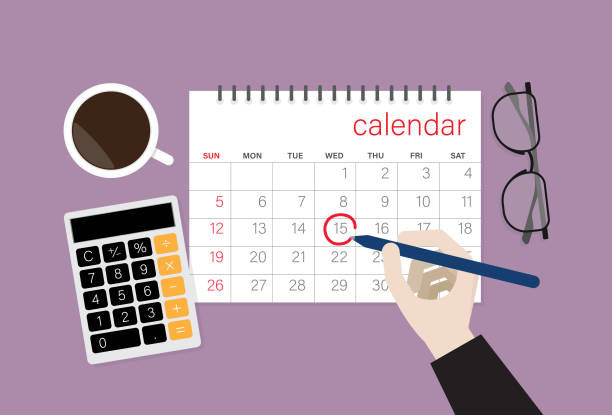 istock Businessman choose a date on a calendar 1219529898