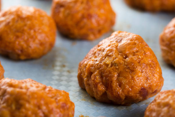 istock Closeup macro homemade minced meat meatballs ready for baking 1219532859