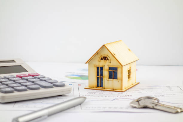 istock There are houses, calculators and keys on the chart 1219533410