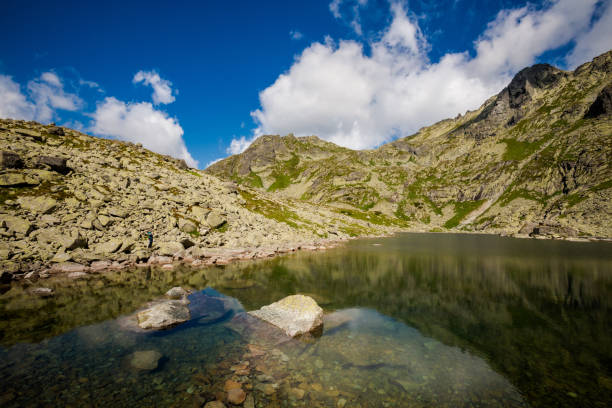 Beautiful way to Rysy (Scratches) - the highest peak of Poland. Path from Slovakia, Strbske, Popradske pleso, Zabie Ridge, frog's lakes valley and Chata pod Rysmi chalet. High Tatra mountains panorama