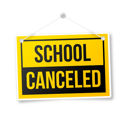 School canceled hanging yellow closed sign.
