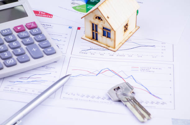 istock There are houses, calculators and keys on the chart 1219533635