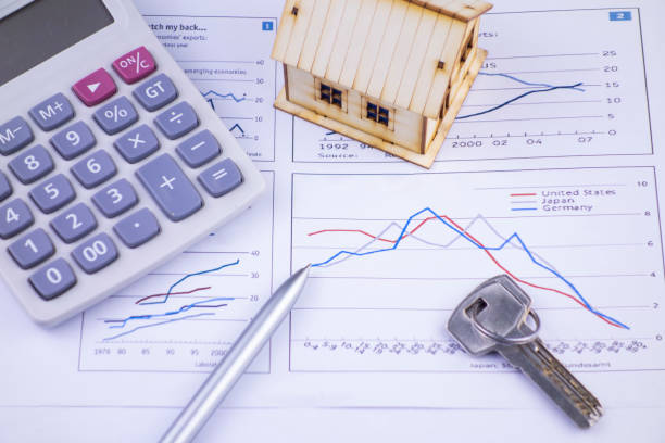 istock There are houses, calculators and keys on the chart 1219533713