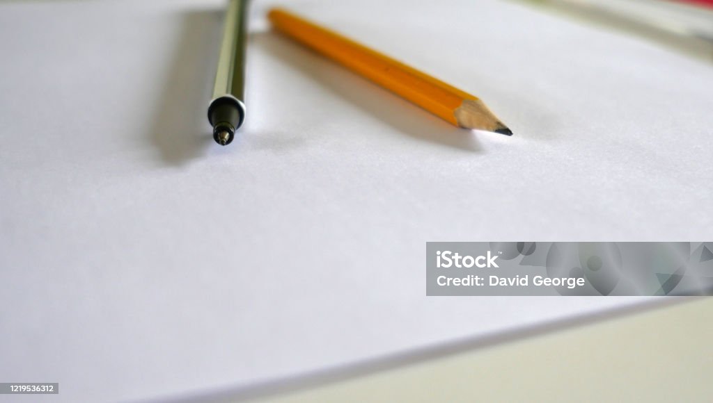 Home schooling equipment under lockdown across the world. Close ups of pens pencils and other equipment being used at home during the Covid19 outbreak across the world Art Stock Photo