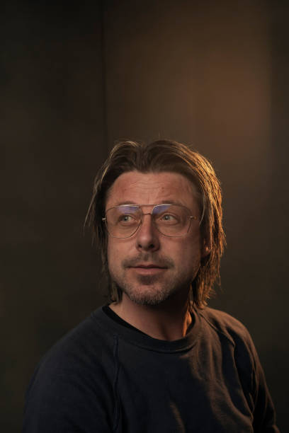 istock Studio portrait of a man wearing retro glasses. 1219536507