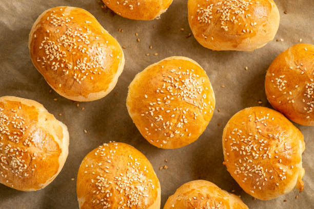 istock Homemade fresh bread buns with sesame seeds. 1219536547