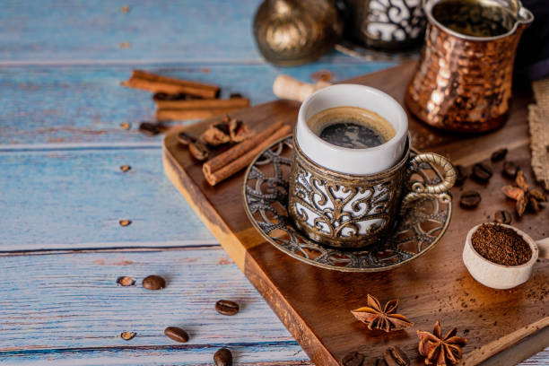 istock Arabian coffee cup on a traditional serving wood 1219542149