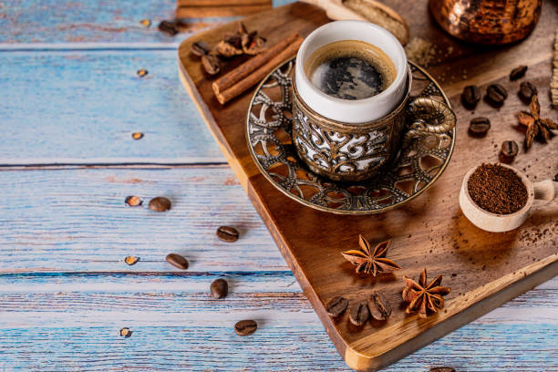 istock Classic coffee cup on a aged blue wood background 1219542350
