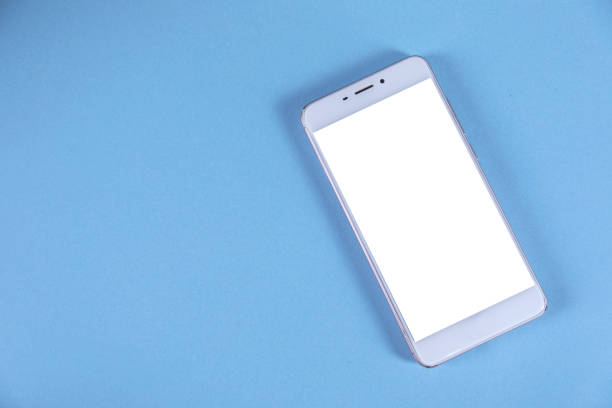 istock white smart phone on the color table 1219544539