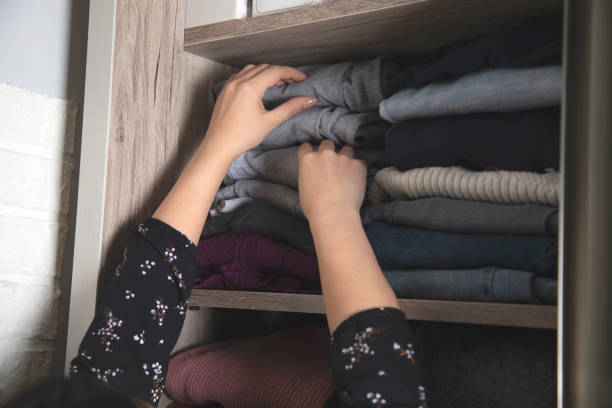 istock woman with  closet 1219544651
