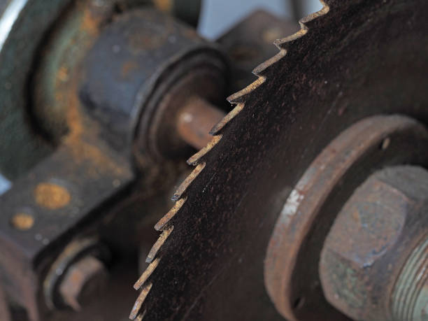 istock Old and rusty circular saw with teeth close-up. Tool for sawing wood 1219549396