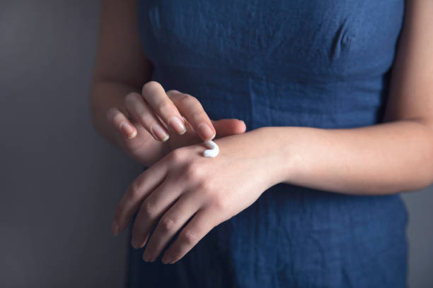 istock Woman hand cream 1219551138