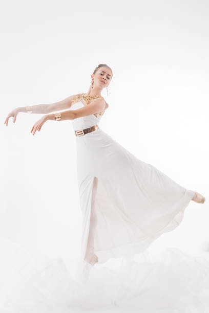 istock Ballerina jump in the clouds 1219553349