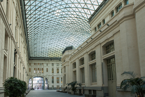 View of the glass gallery roof of the inner courtyard of the city hall complex in Madrid city, Spain.