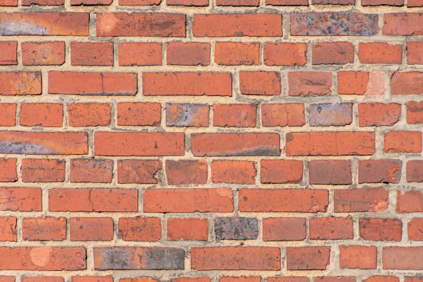 istock Old red brick dutch clinker facade of industrial building close up pattern 1219558246