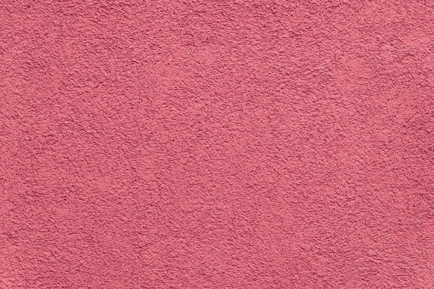 istock Texture of red painted and plastered building facade 1219558397