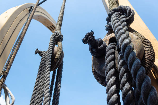 istock Close view of block and tackle, rope rigging on an old ship 1219558482