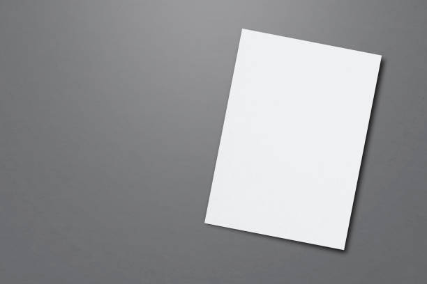 istock Blank paper sheets for brochure on grey background, top view. Mock up 1219558814