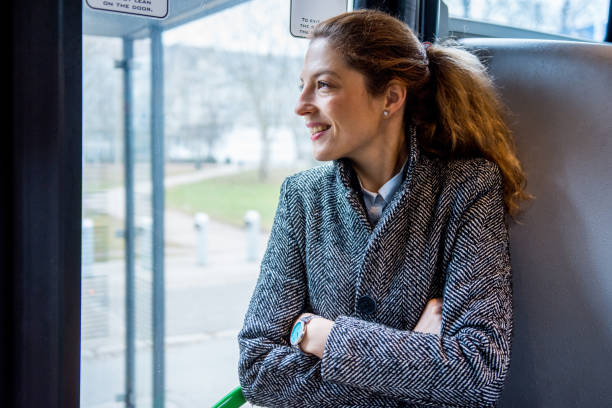 istock Woman driving on a public bus 1219559956