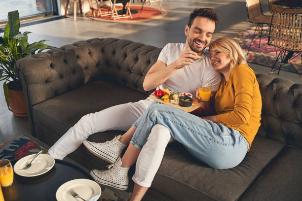 istock Smiling woman resting her head on her husbands shoulder 1219561486