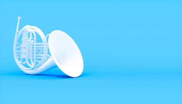 istock white french horn on a blue background 1219563966