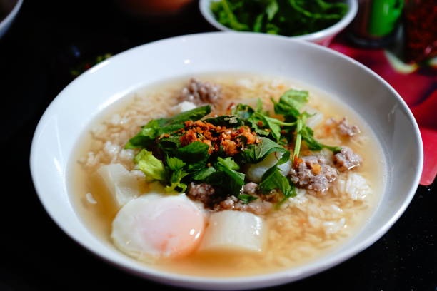 istock Rice soup with vegetables and Soft-boiled eggs 1219564025