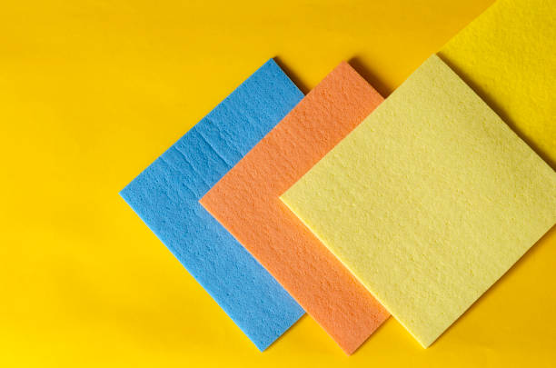 istock Kitchen napkin for cleaning on yellow. 1219565826
