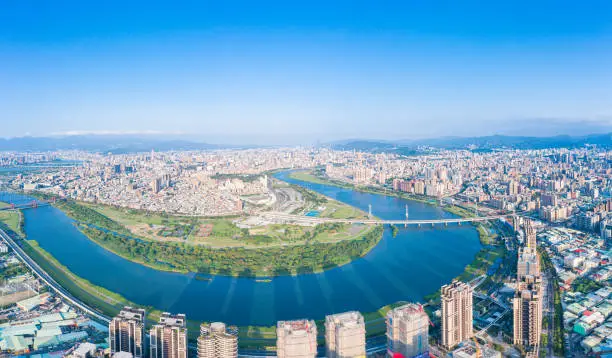 Taipei City Aerial View - Asia business concept image, panoramic modern cityscape building bird’s eye view under daytime and blue sky, shot in Taipei, Taiwan.