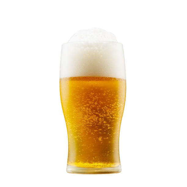 istock A glass of light cold beer with foam on a white background. In isolation 1219567224