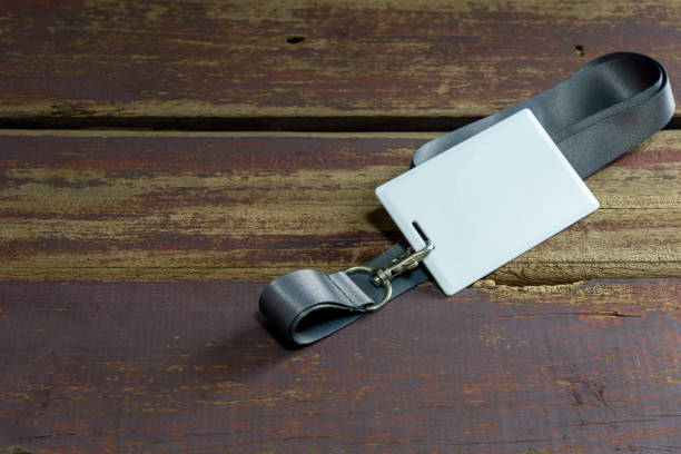 istock Proximity or RFID card for control security, access, protect on brow wood table. 1219567460