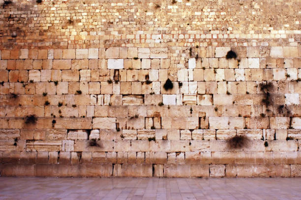 The Western Wailing Wall Kotel empty in Jerusalem old city Israel The Western Wailing Wall Kotel Empty in Jerusalem old city, Israel.The Wall is the holiest place where Jews are permitted to pray, though the holiest site in the Jewish faith lies behind it. wailing wall stock pictures, royalty-free photos & images